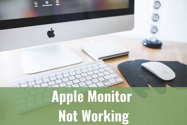 Apple monitor on the desk table