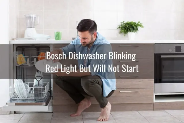 Confused man while looking at the dishwasher