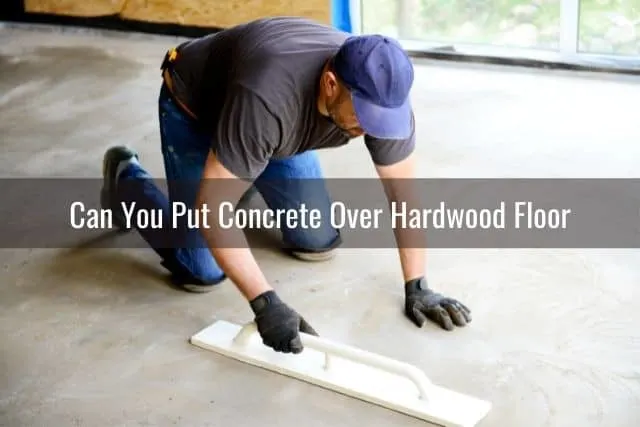 Man making smooth concrete floors