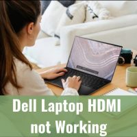 Woman typing at her Dell Laptop