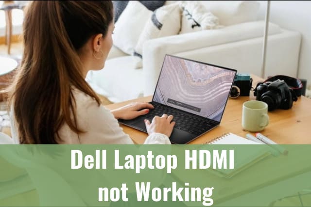 Woman typing at her Dell Laptop