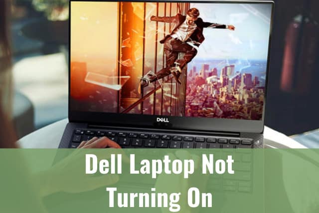 Woman typing while using Dell Laptop