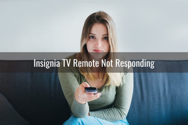 Sad woman while holding a remote
