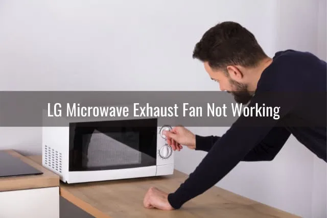 Man adjusting Microwave