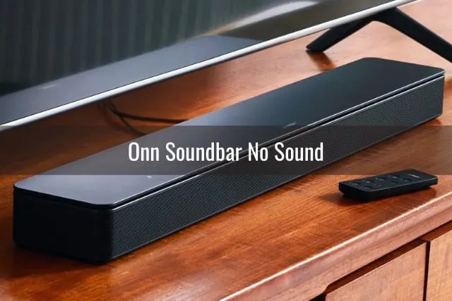 Soundbar in front of TV
