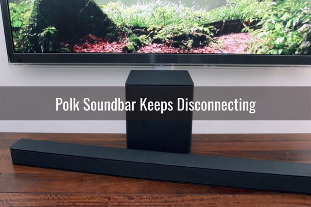 Black Polk behind the flatscreen tv