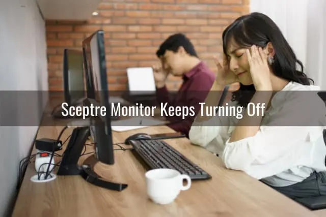 Frustrated woman while looking at the monitor