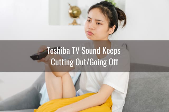 sad woman while holding a remote