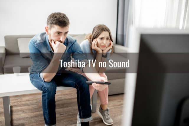 Confused couple while watching tv