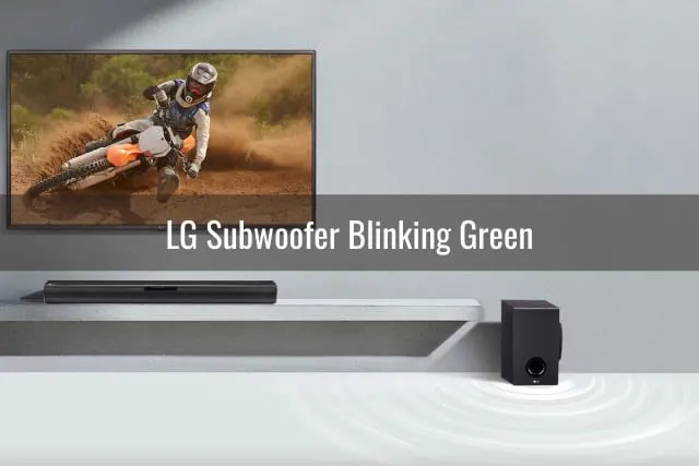 Black Subwoofer with flatscreen TV and soundbar behind