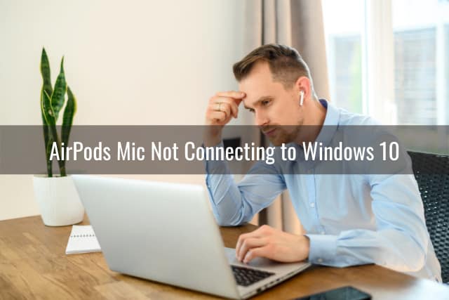 Frustrated man using an AirPods and Laptop