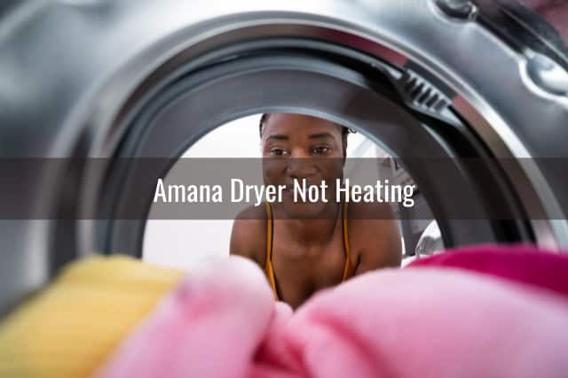 Woman putting clothes in dryer