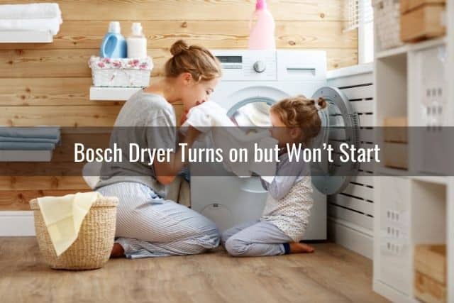 Mom and girl sitting in front of dryer machine