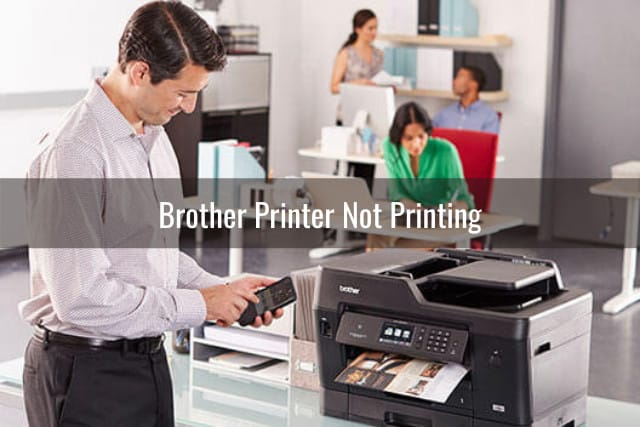 Man standing while printing