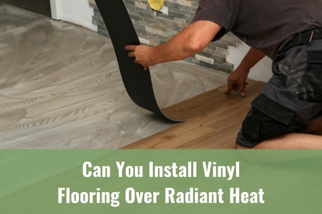 Man putting vinyl tile on the floor
