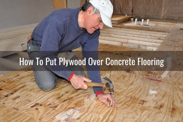 Man fixing the plywood floor