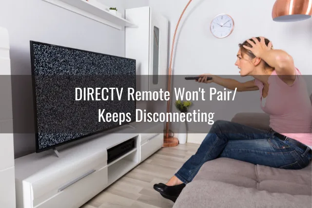 Confused woman while holding a remote