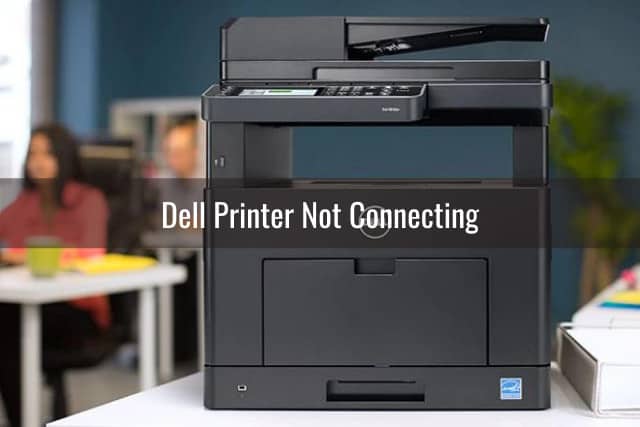Black dell printer in the desk
