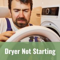 man fixing the dryer