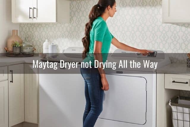 Female adjusting dryer machine settings