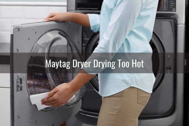 Female putting dryer sheet in dryer machine