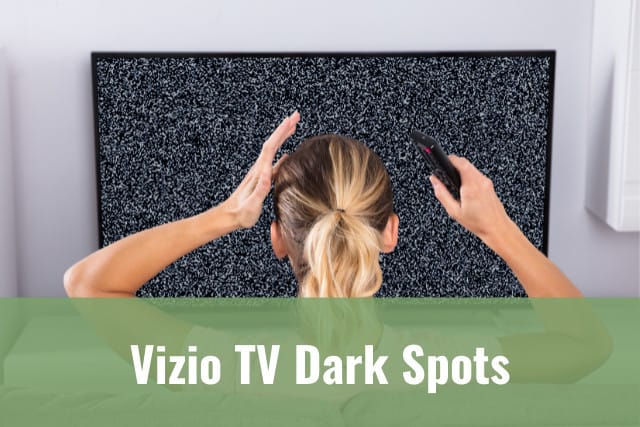 frustrated woman with black and white dots on TV