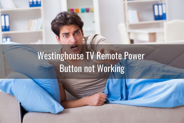 Frustrated man holding a remote