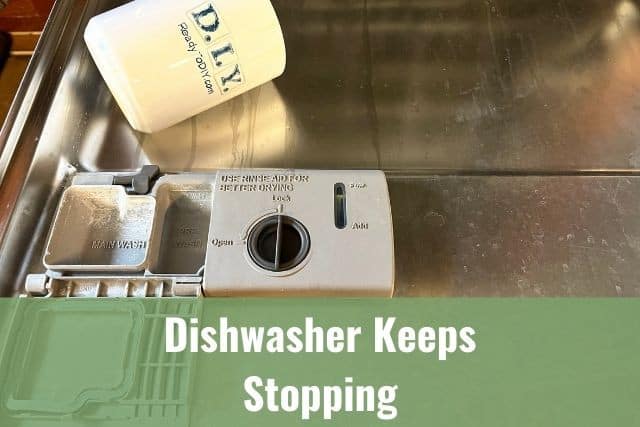 dishwasher door with dirty soap dispenser with caption dishwasher keeps stopping