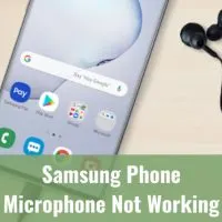 Samsung phone with earphone on the table