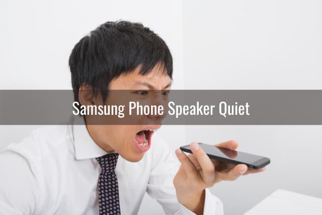 man holding a phone while speaking