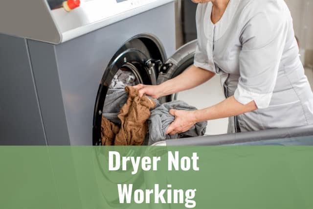 putting clothes inside the dryer