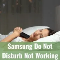 Holding phone while asleep on bed