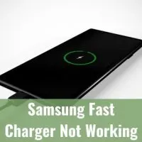 Black phone charging with cable