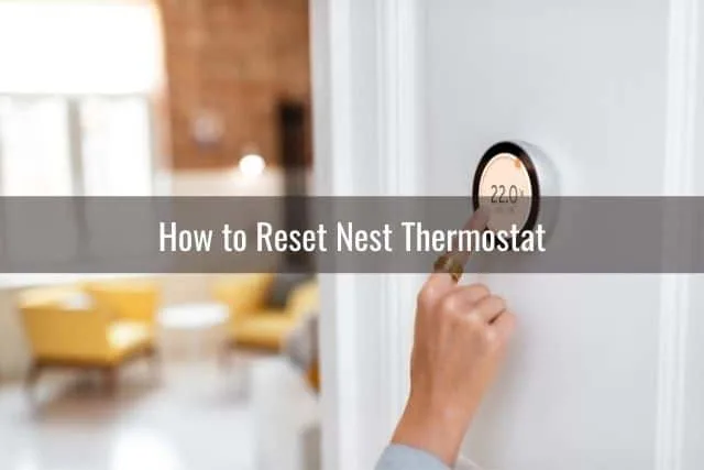 Adjusting temperature on house thermostat