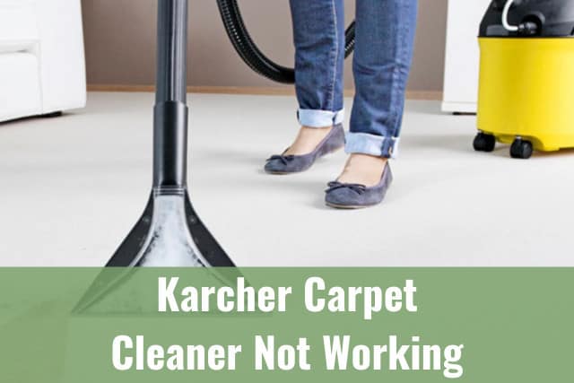 Woman cleaning the carpet using Karcher