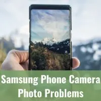 holding a phone while taking picture