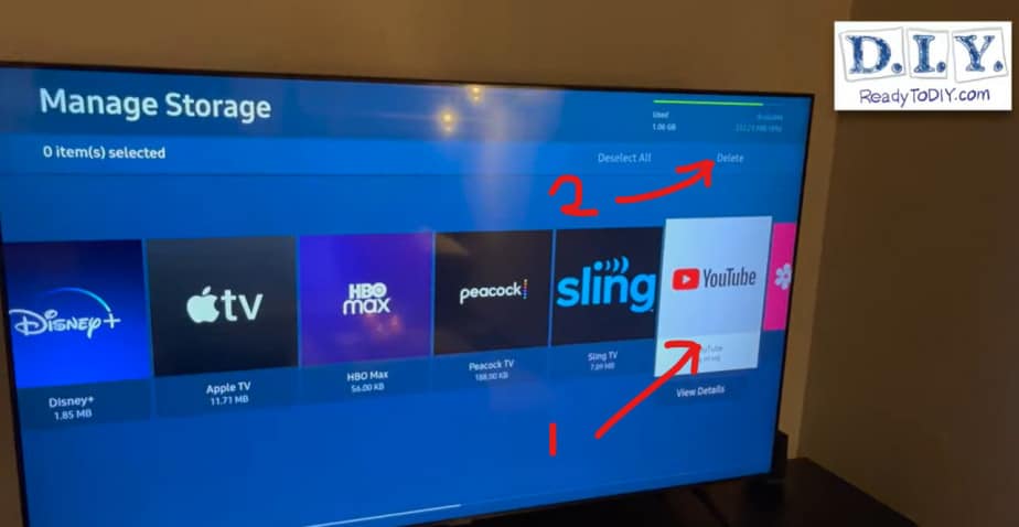 Shows photo of Samsung TV's Manage Storage screen with label's 1 and 2, 1 being click the app, and 2 click delete to delete app.