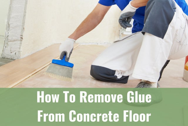Man removing glue on the floor
