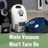 Different vacuum cleaners on carpet
