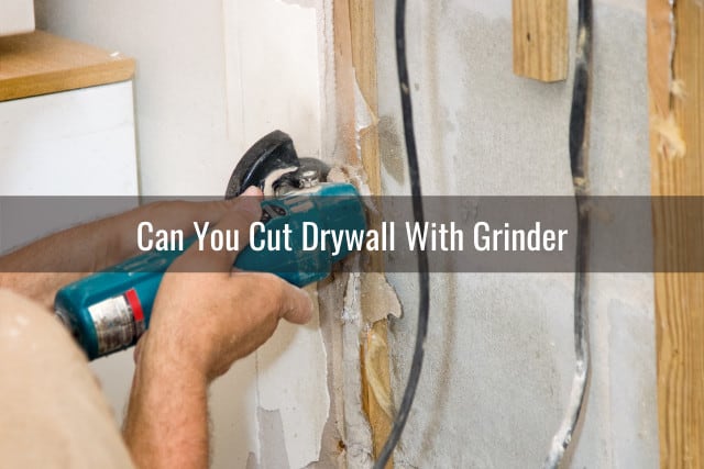 Man cutting the wall using grinder