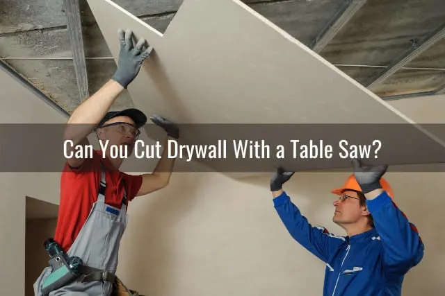 Man cutting the wall using table saw