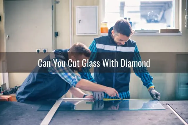 Man cutting the glass using diamond