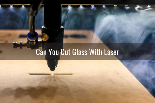 Man cutting the glass using laser