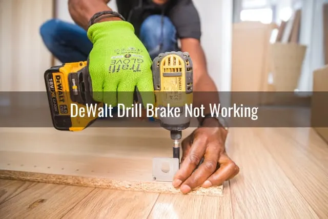 Man using drill in the wood
