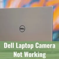 Silver dell laptop on the table