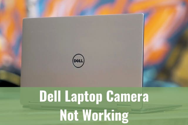 Silver dell laptop on the table