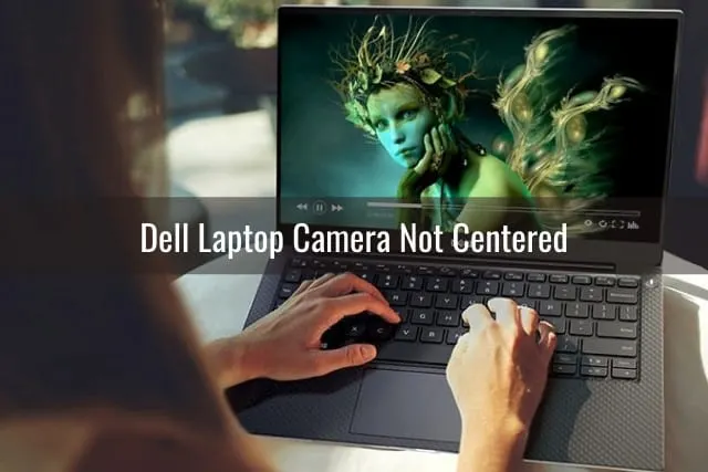 Black dell laptop while using it