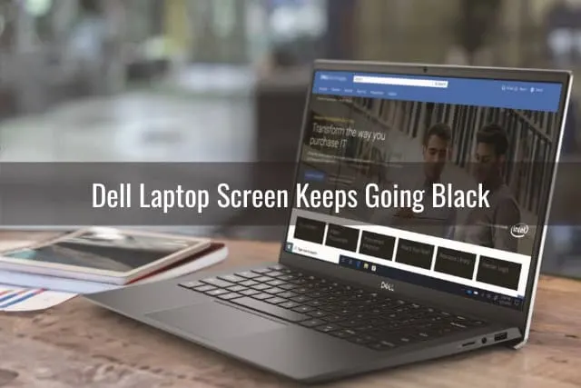 Black dell laptop on the desk