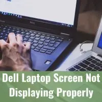 Black dell laptop on the desk