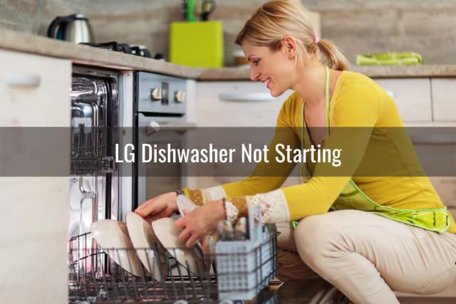 Woman checking the dishwasher